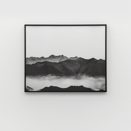 Framed grayscale landscape wall art with mountain peaks and fog, black frame