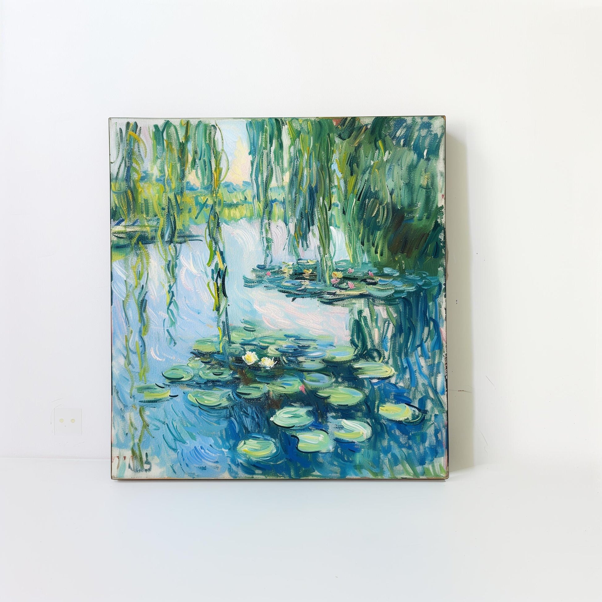 Framed pond artwork with green lily pads and reeds on canvas